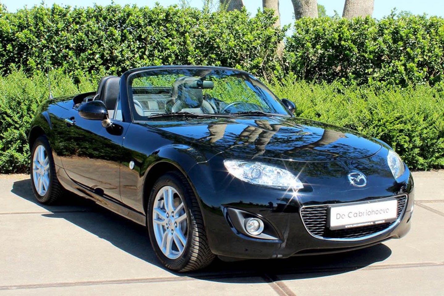 Mazda MX-5 Roadster Coupé - NC 1.8l Stralend Zwart Doorzichtig - AutoWereld.nl