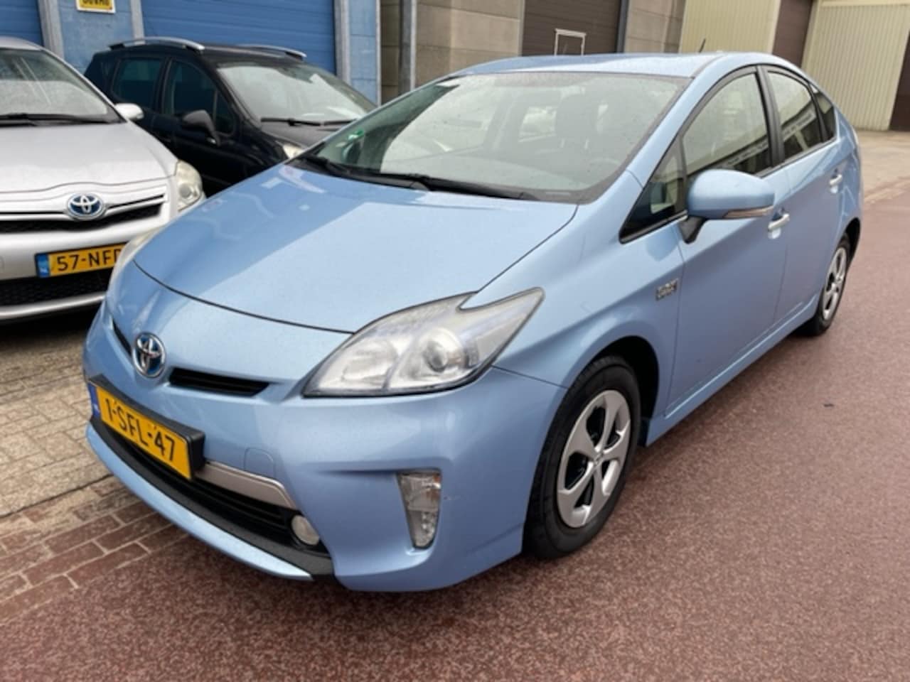 Toyota Prius - 1.8 Plug-in Aspiration 2013 met 234.756km NAP 2e eigenaar - APK feb-2025. Alle boekjes zij - AutoWereld.nl