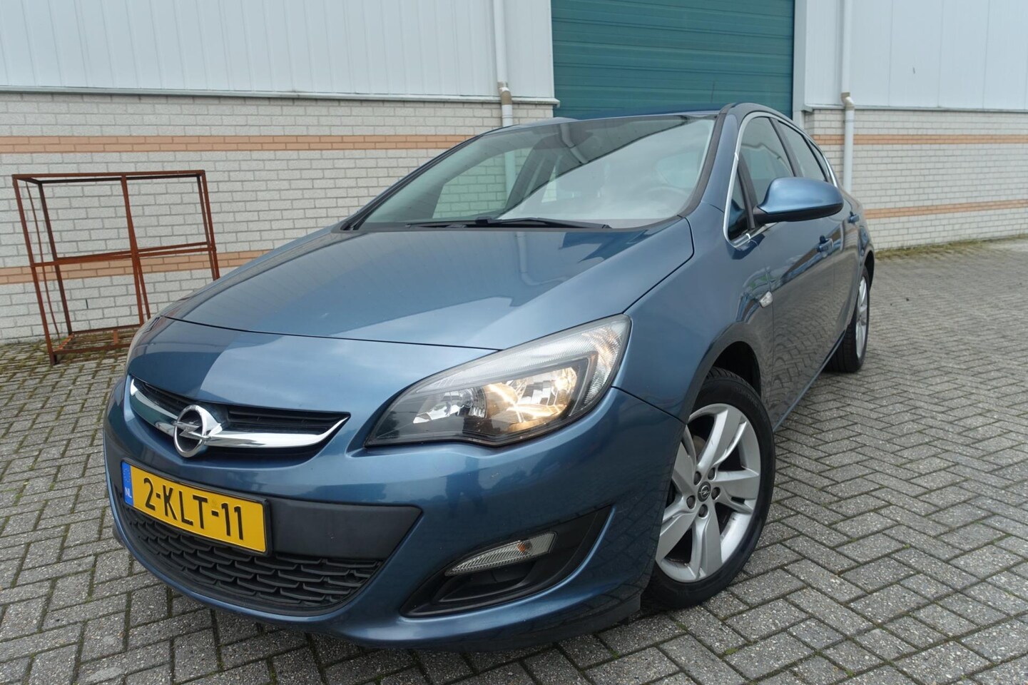 Opel Astra - 1.4 Turbo Berlin - trekhaak - zgan all season banden elec.ramen - 17 "lm velgen - airco - - AutoWereld.nl