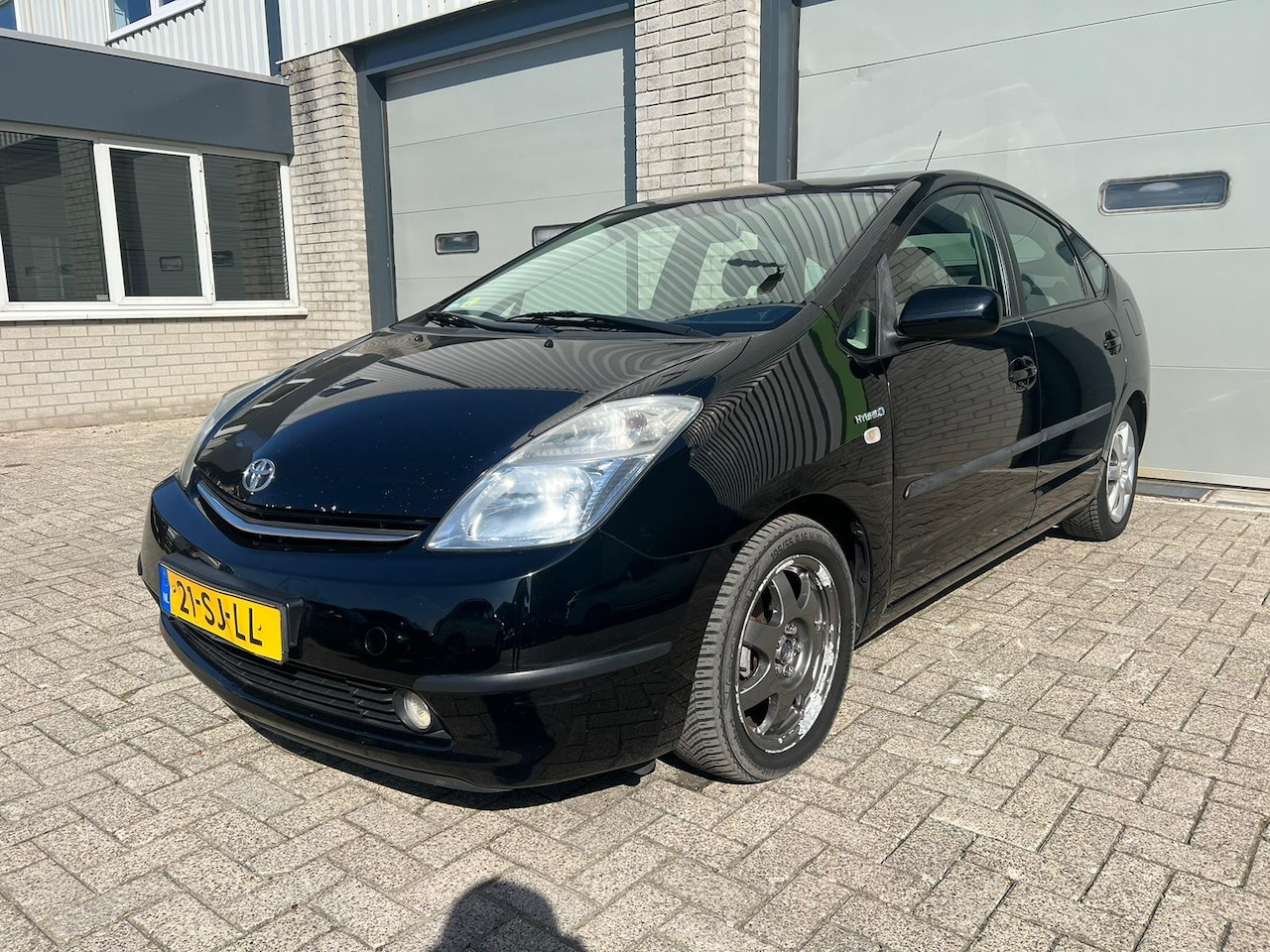 Toyota Prius - 1.5 VVT-i Business Edition *NAVI/ECC* - AutoWereld.nl