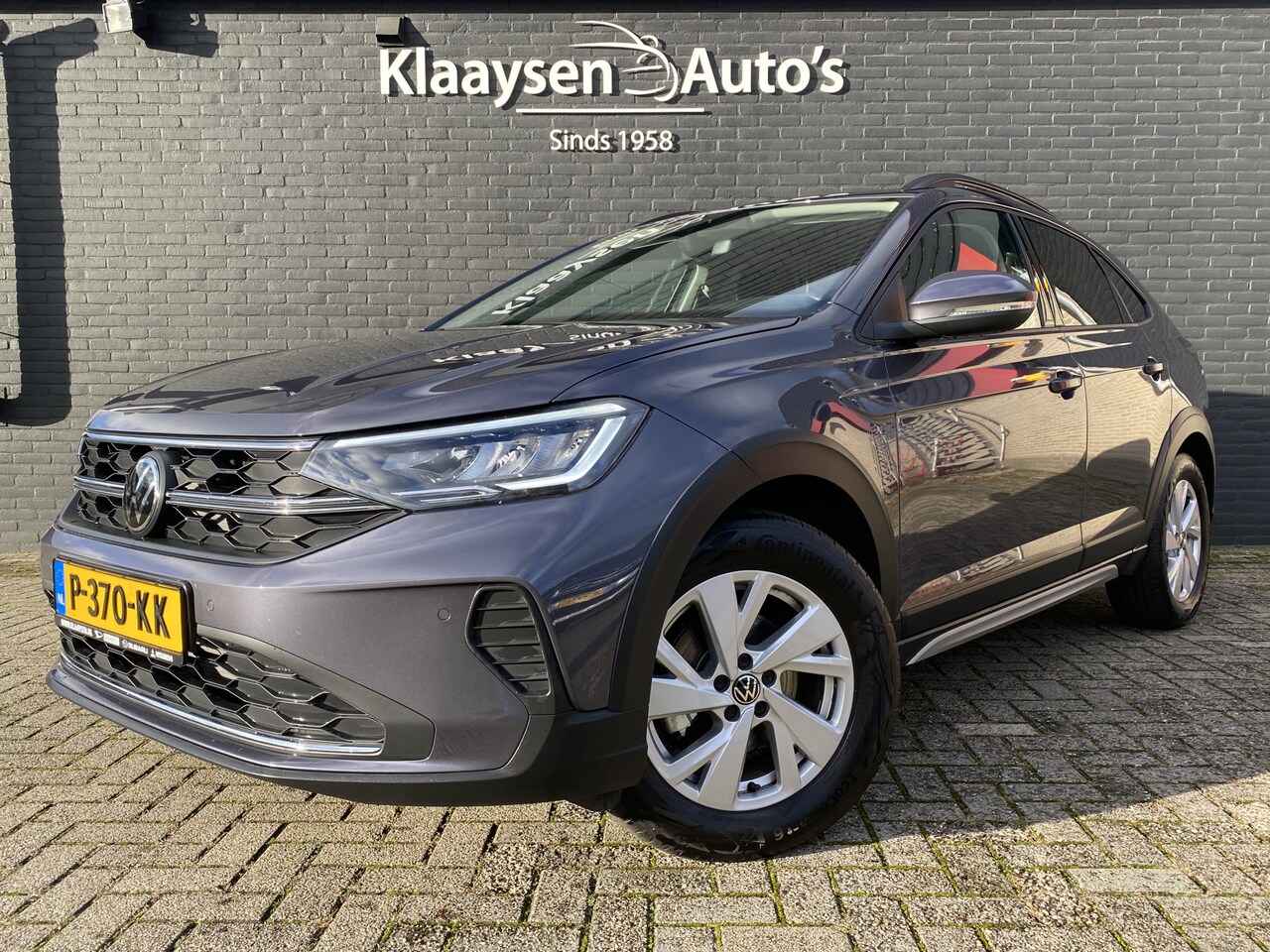 Volkswagen Taigo - 1.0 TSI Style AUT. | navigatie | camera | adaptieve cruise | apple carplay | 4800 KM - AutoWereld.nl