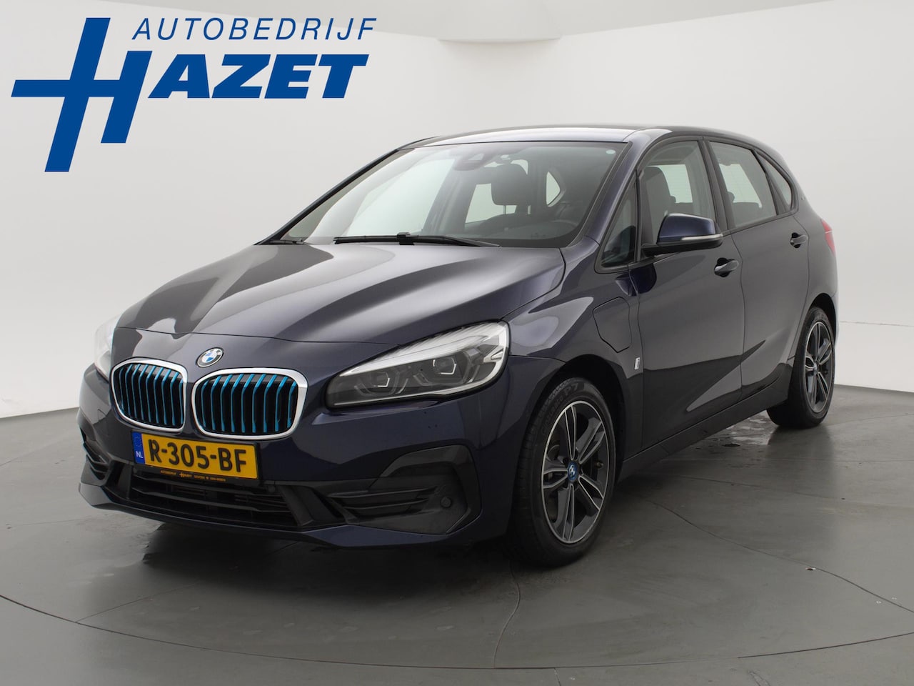 BMW 2-serie Active Tourer - 225xe 224 PK XDRIVE PLUG-IN HYBRID + STOELVERWARMING / AFN. TREKHAAK / NAVIGATIE - AutoWereld.nl