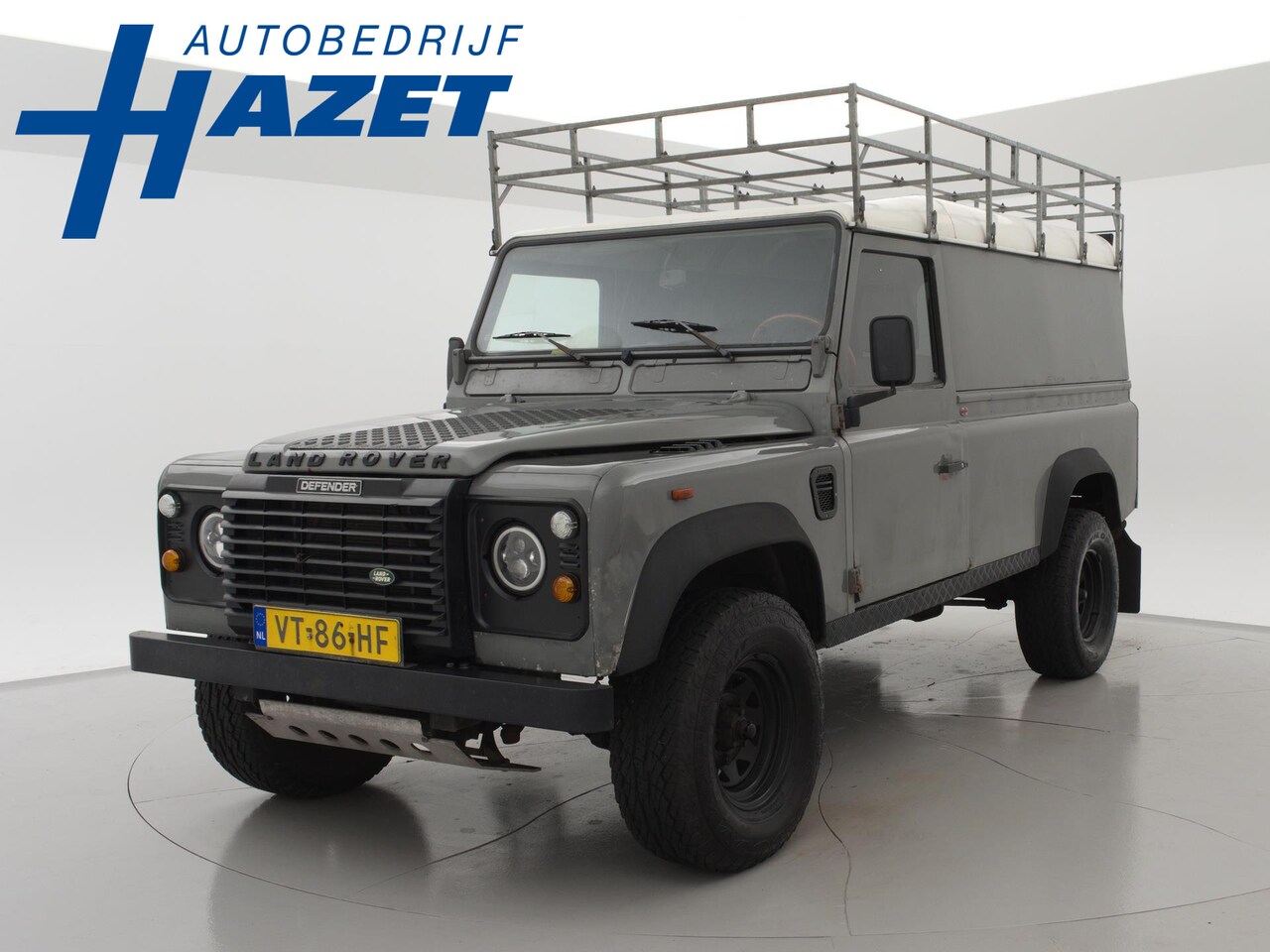 Land Rover Defender - 110" 2.5 TDI GRIJS KENTEKEN ORIGINEEL NEDERLANDS - 3 ZITS + IMPERIAAL / 3500 KG TREKHAAK - AutoWereld.nl