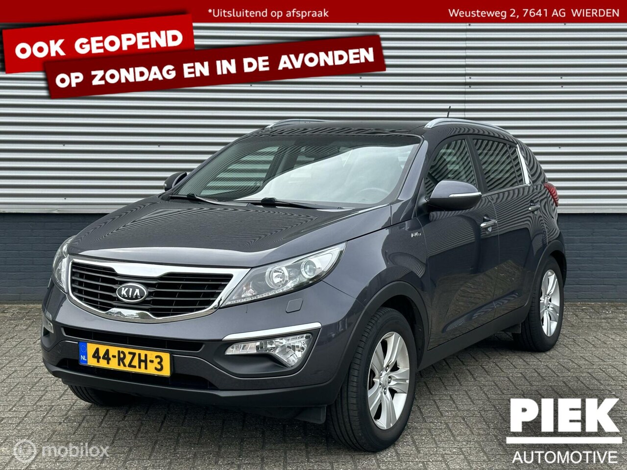 Kia Sportage - 2.0 X-ecutive 4wd Plus Pack AWD PANORAMADAK - AutoWereld.nl