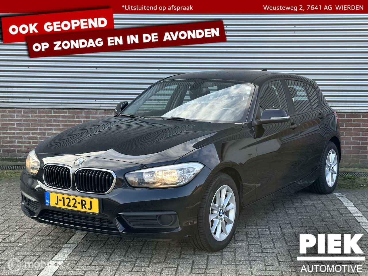 BMW 1-serie - 116i High Executive NETTE STAAT, NAVIGATIE - AutoWereld.nl