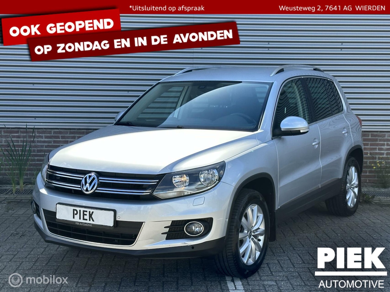 Volkswagen Tiguan - 1.4 TSI Sport&Style 4Motion NIEUWSTAAT - AutoWereld.nl