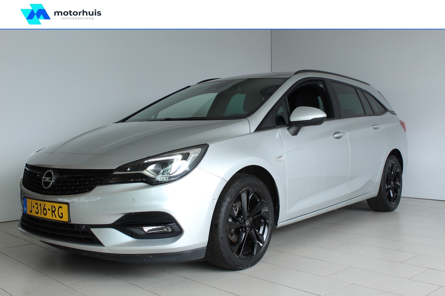 Opel Astra Sports Tourer - 1.2 Turbo 145pk Start/Stop Ultimate TREKHAAK WINTERPACK CAMERA - AutoWereld.nl