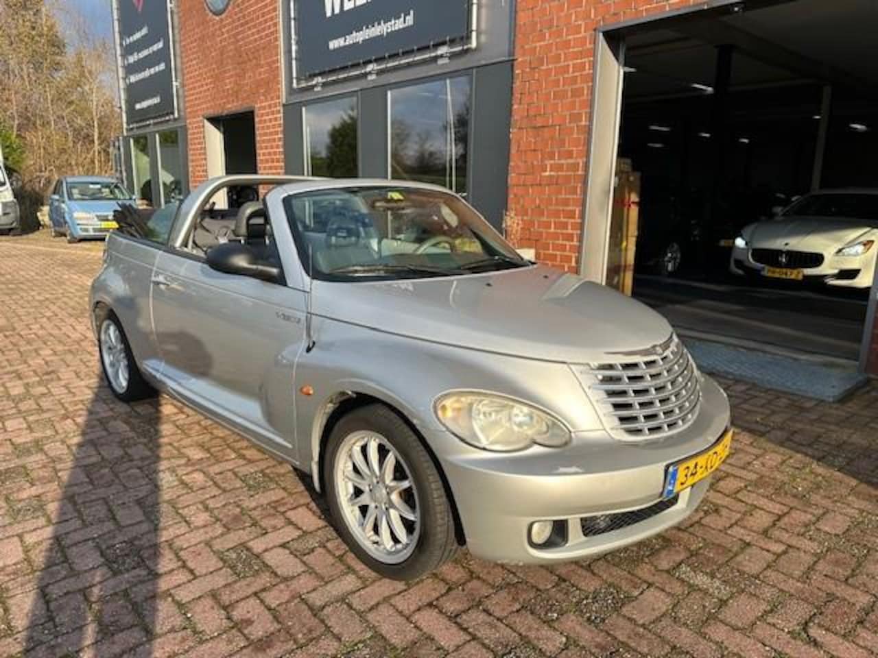 Chrysler PT Cruiser Cabrio - 2.4i Limited Leer - AutoWereld.nl