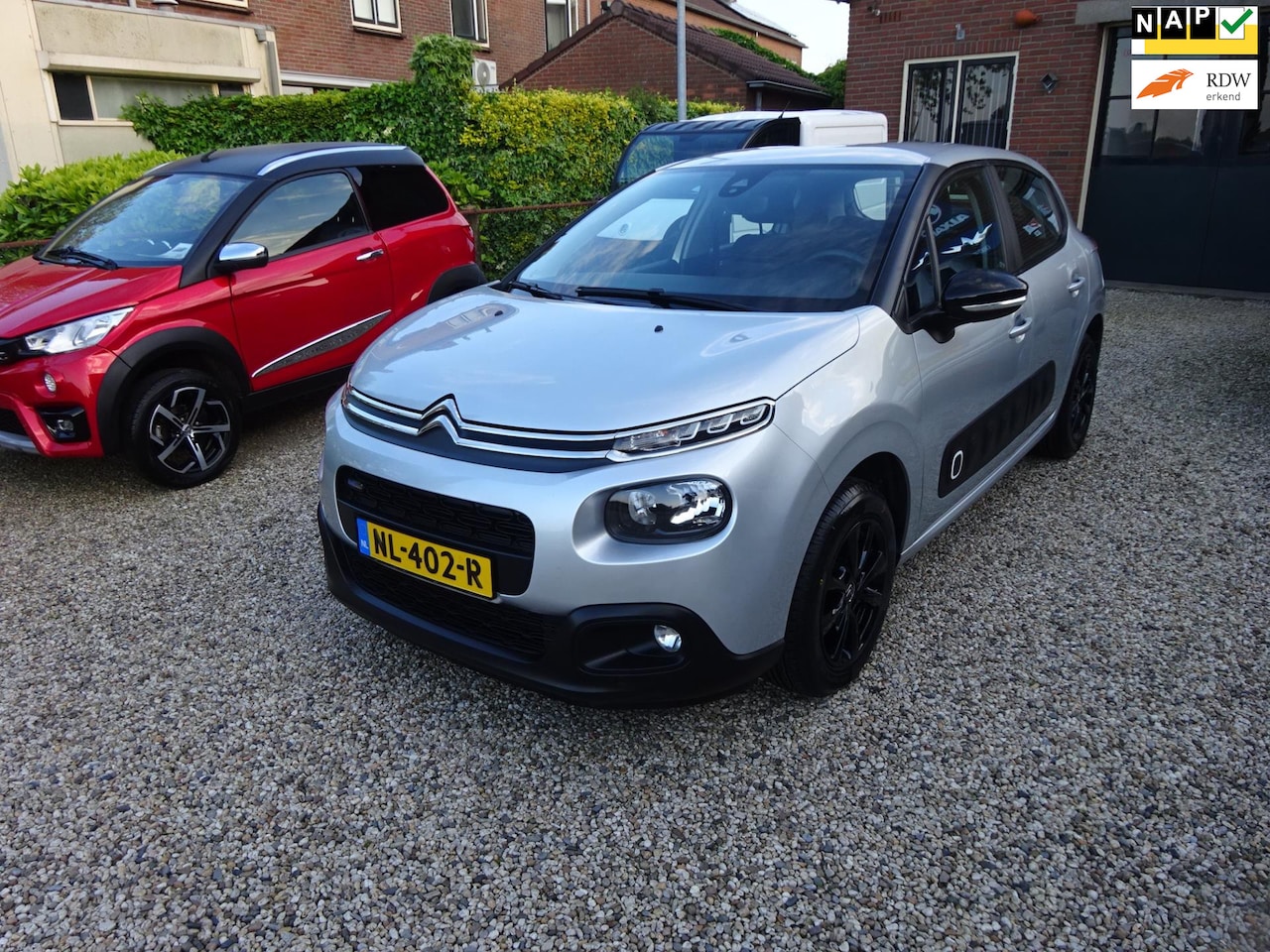 Citroën C3 - 1.2 PureTech Feel 105g Climate controle, Navigatie, Lichtmetalen velgen, Trekhaak afneemba - AutoWereld.nl