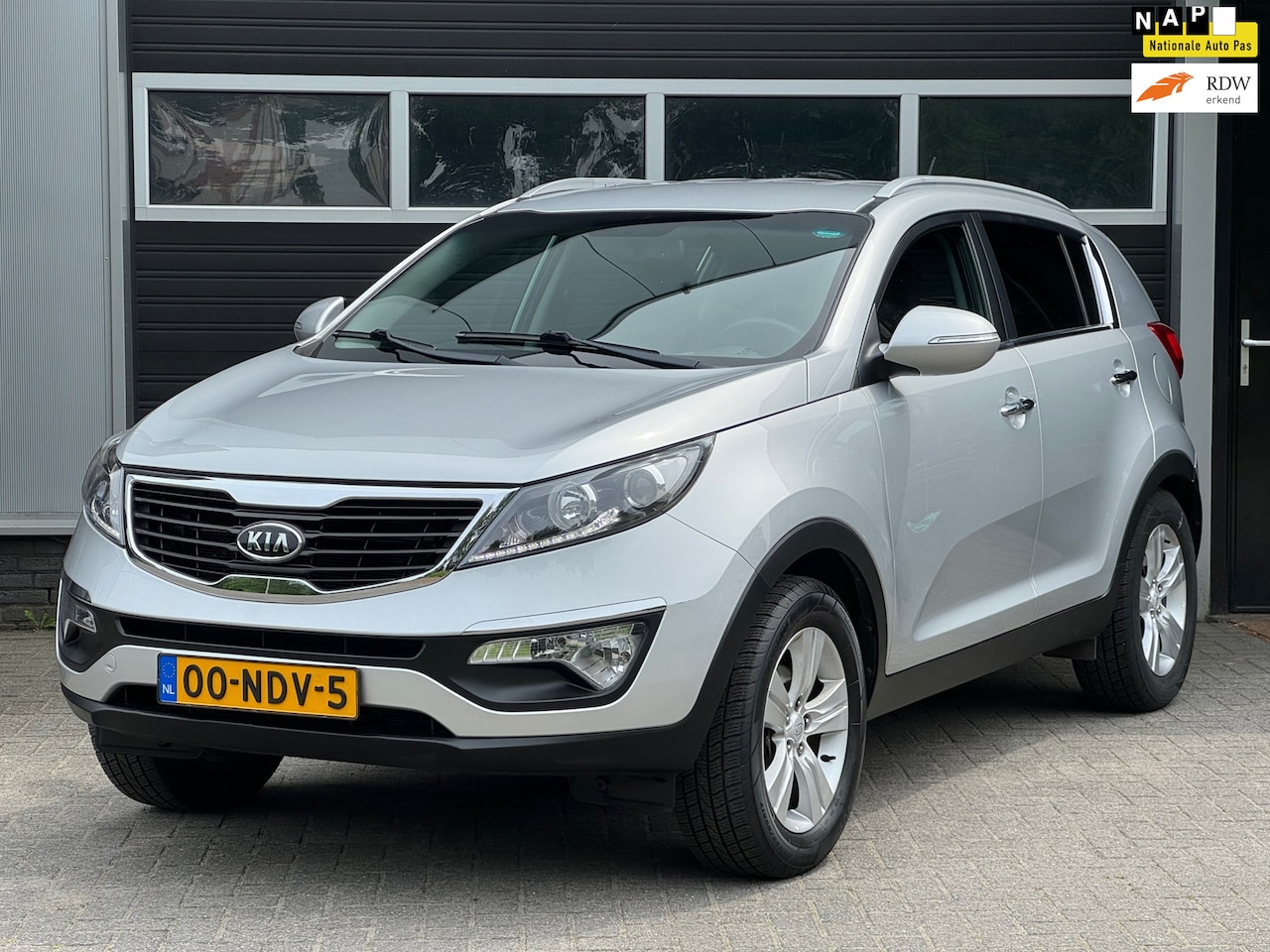 Kia Sportage - 2.0 X-ecutive Plus Pack Climate Control, Cruise Control, PDC, NAP - AutoWereld.nl