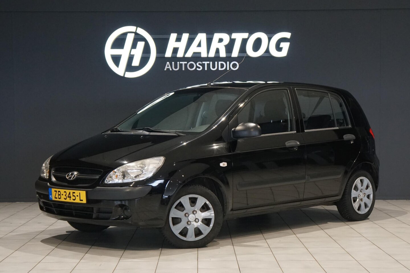 Hyundai Getz - 1.1i Active + AIRCO - AutoWereld.nl