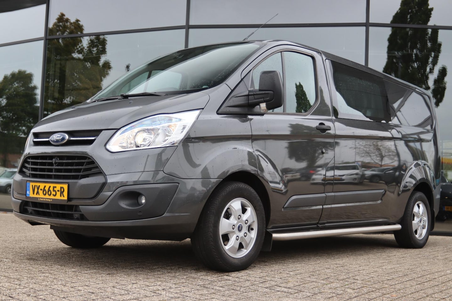 Ford Transit Custom - 2.2 TDCI L2H1 DC TREND | LEDER | NAVI | CAMERA | TREKHAAK - AutoWereld.nl