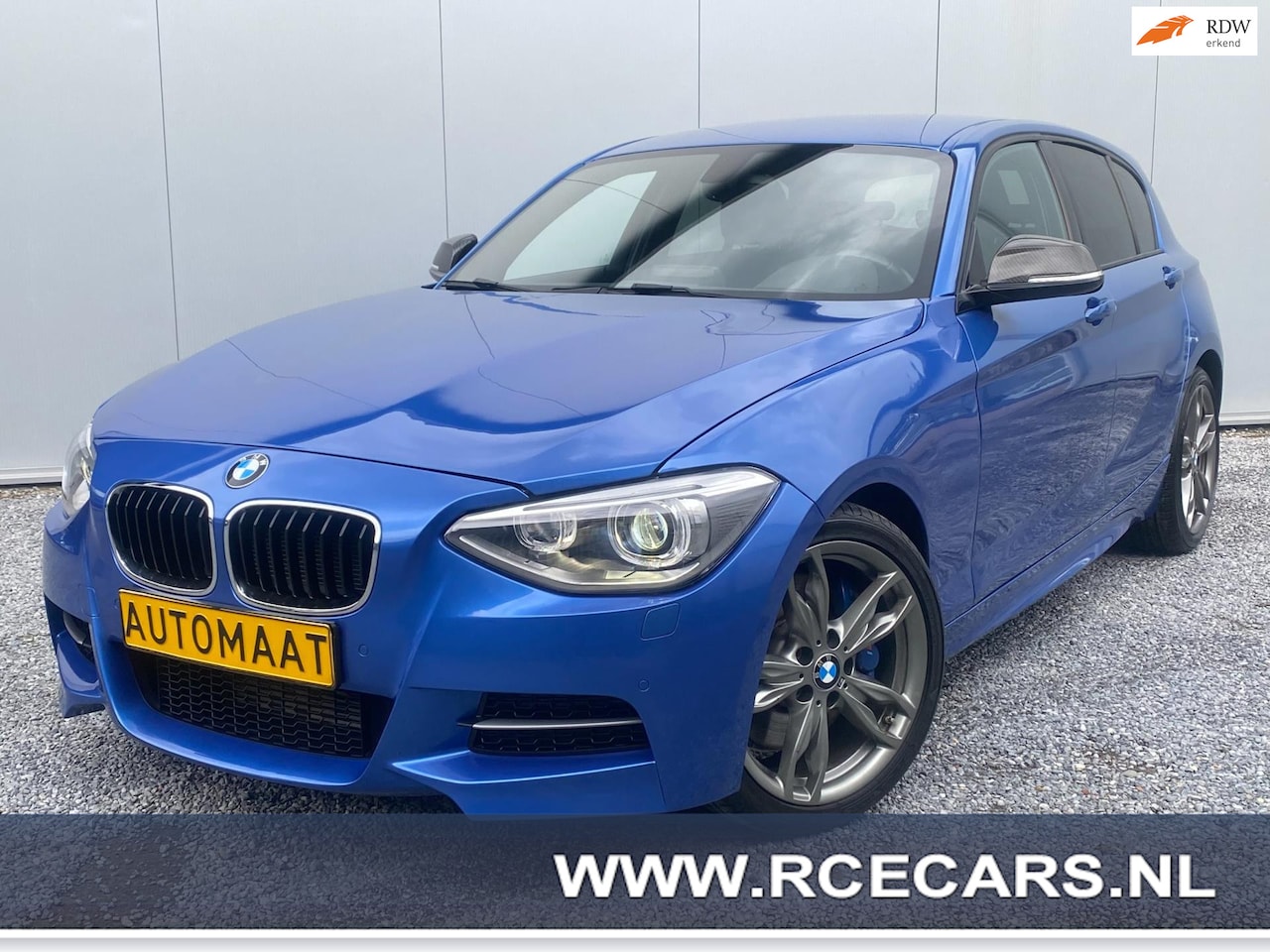 BMW 1-serie - M135i xDrive Executive Navigatie|Harman Kardon|Clima|Xenon|Alcantara | 320 PK !!! - AutoWereld.nl