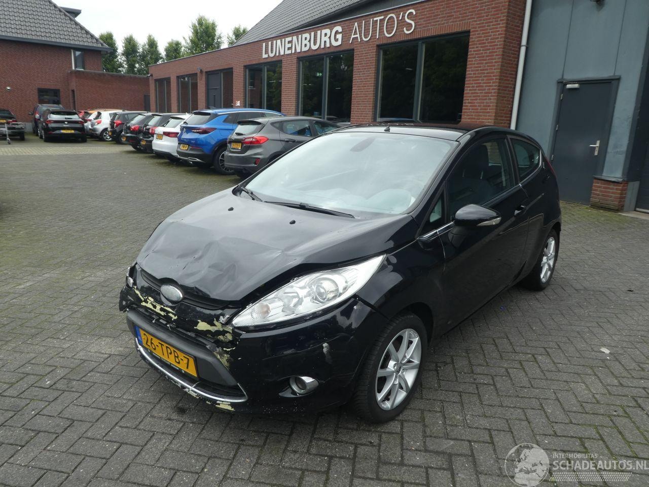 Ford Fiesta - 1.4 Ghia Airco - AutoWereld.nl