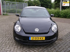 Volkswagen Beetle - 1.2 TSI Design BlueMotion met navigatie en cruise en dual climate climate control