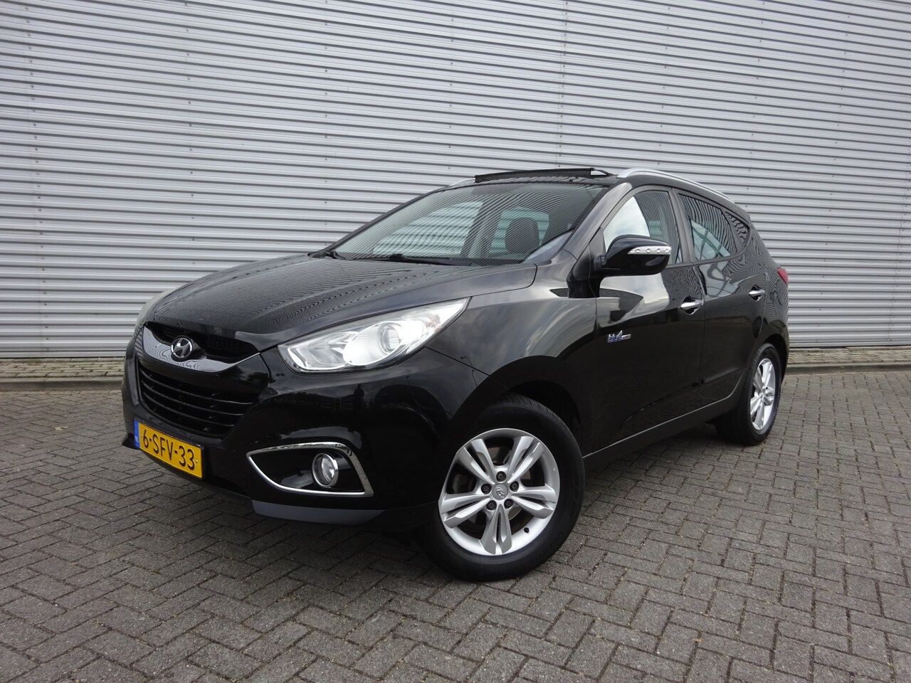 Hyundai ix35 - 1.6i GDI Style Panoramadak / Climate / Cruise control - AutoWereld.nl