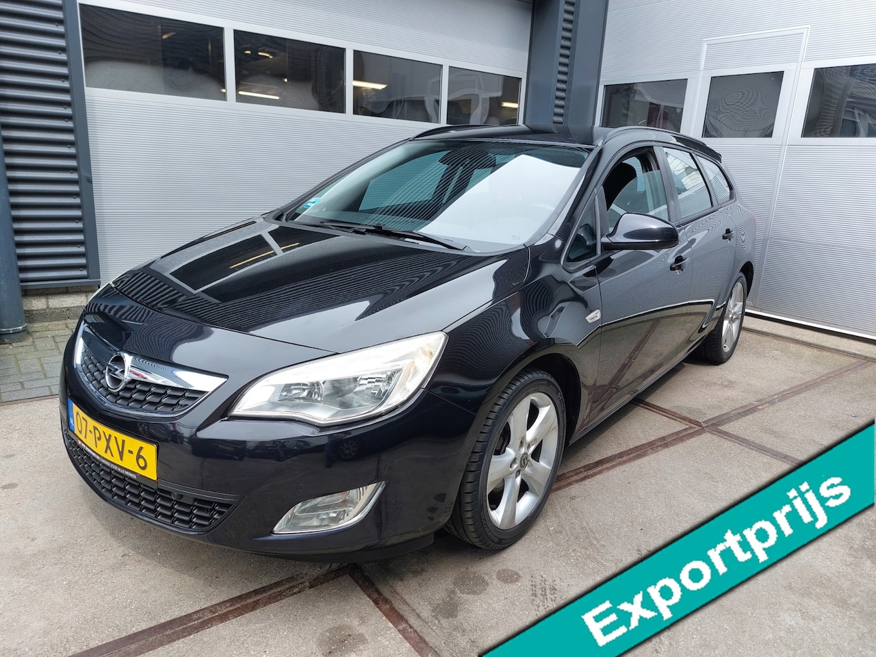 Opel Astra Sports Tourer - 1.3 CDTi AIRCO NAVI LMV Euro 5 - AutoWereld.nl