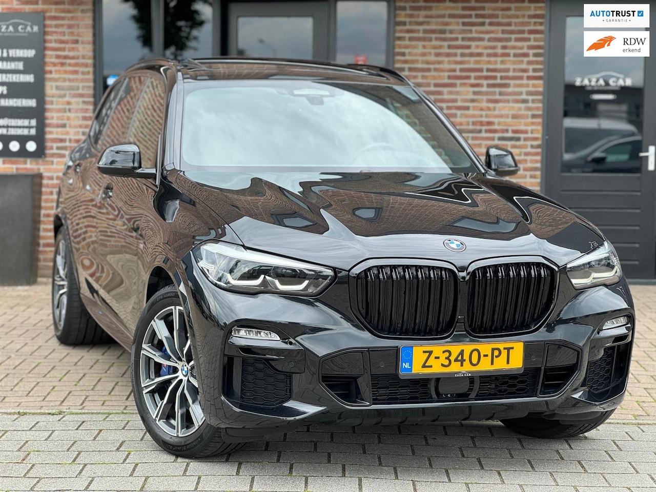 BMW X5 - XDrive 45e High Executive M-Sport Pano HUD Camera M-pakket - AutoWereld.nl