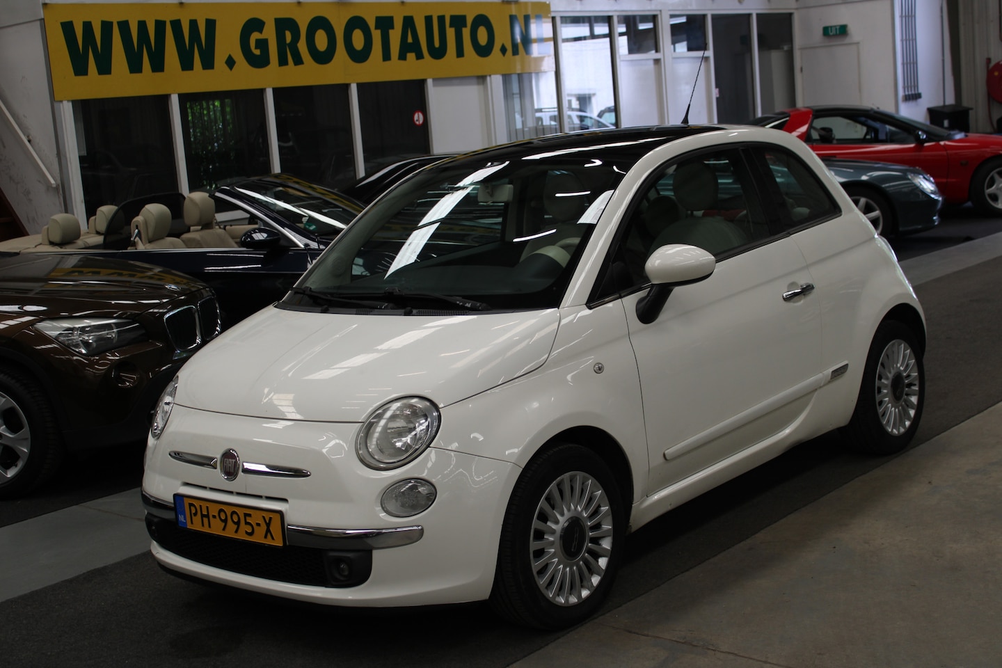 Fiat 500 - 1.2 Lounge Panoramadak, Airco, Stuurbekrachtiging - AutoWereld.nl