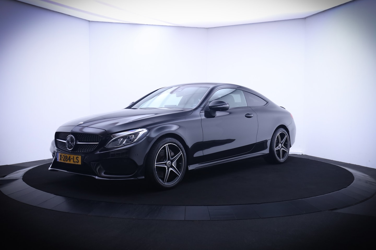 Mercedes-Benz C-klasse Coupé - 250 Aut.9 211Pk AMG-Line Premium FULL LED/AMBIANCE LIGHT/360CAM/ADAPTIVE CRUISE/NAVI/BLIND - AutoWereld.nl