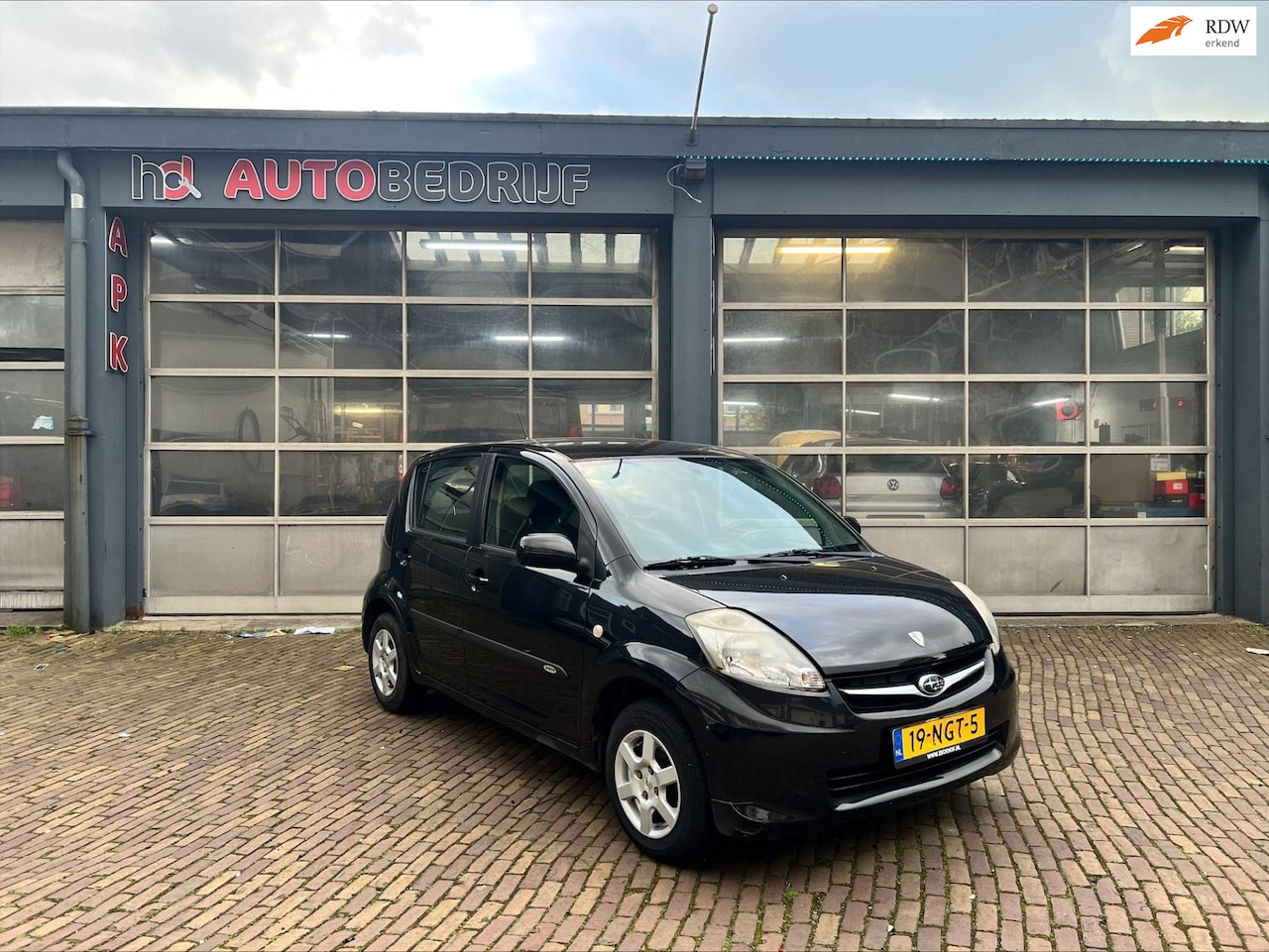 Subaru Justy - 1.0 Black & White 5-DRS AIRCO - AutoWereld.nl