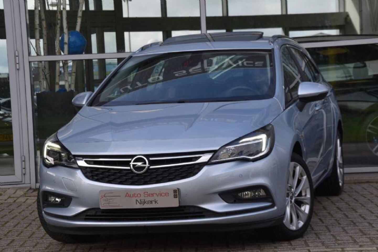 Opel Astra Sports Tourer - 1.0 Edition Airco Nav. Dak Led Pdc Trekhaak - AutoWereld.nl