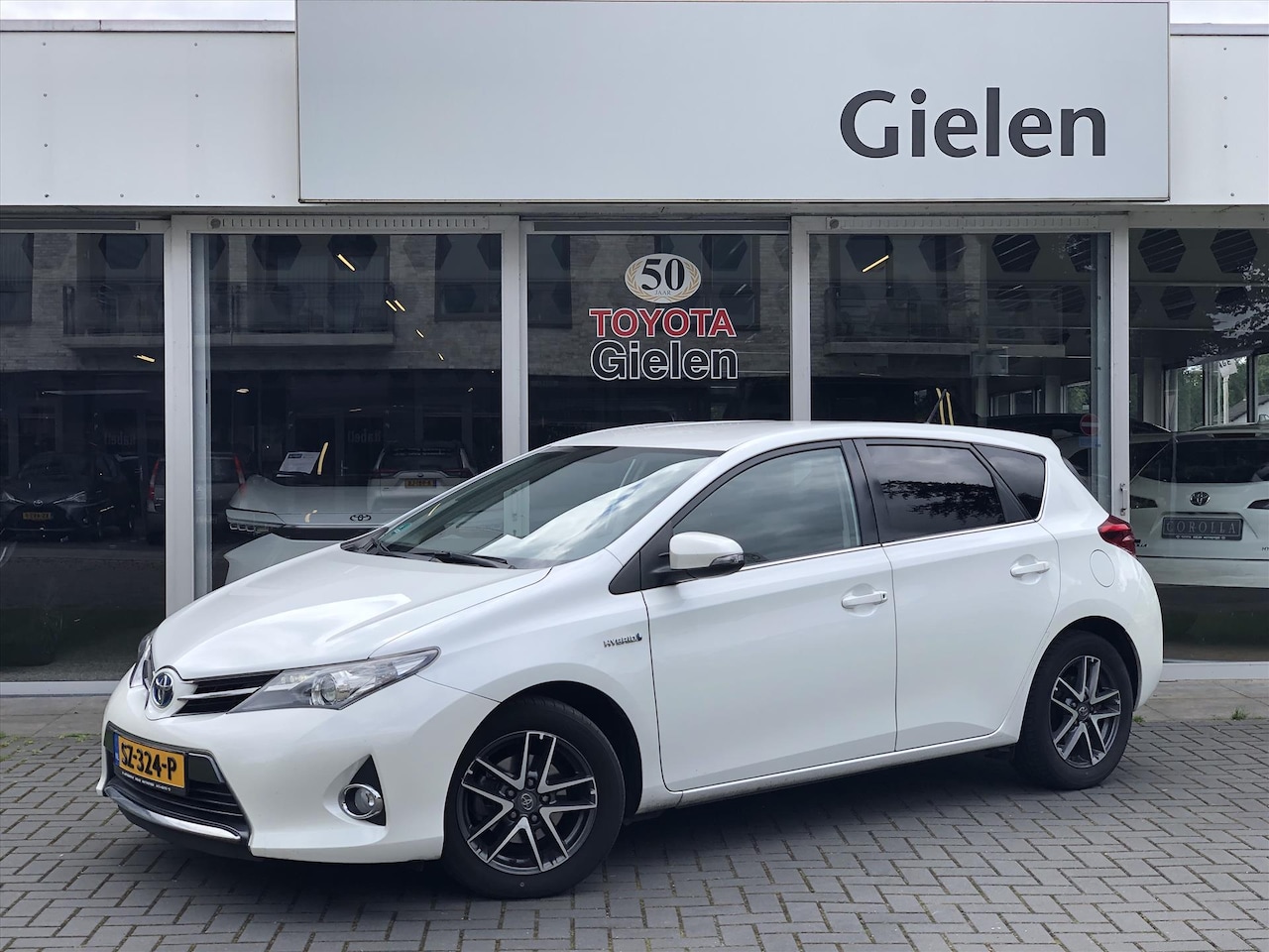 Toyota Auris - 1.8 Hybrid Dynamic | Navigatie, Parkeercamera, 16 inch Lichtmetalen velgen, Privacy Glass, - AutoWereld.nl