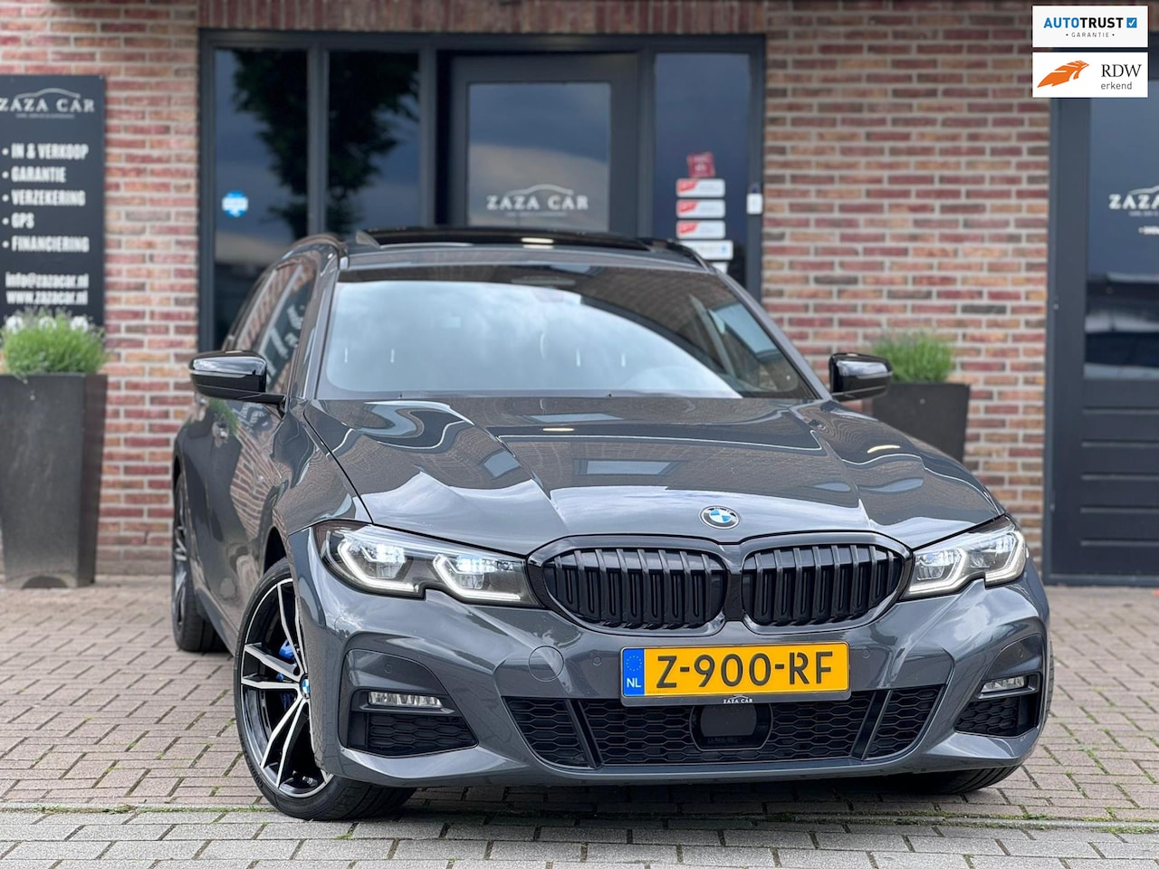 BMW 3-serie Touring - 330e Hybride Nardo M-sport Pano Camera HUD - AutoWereld.nl