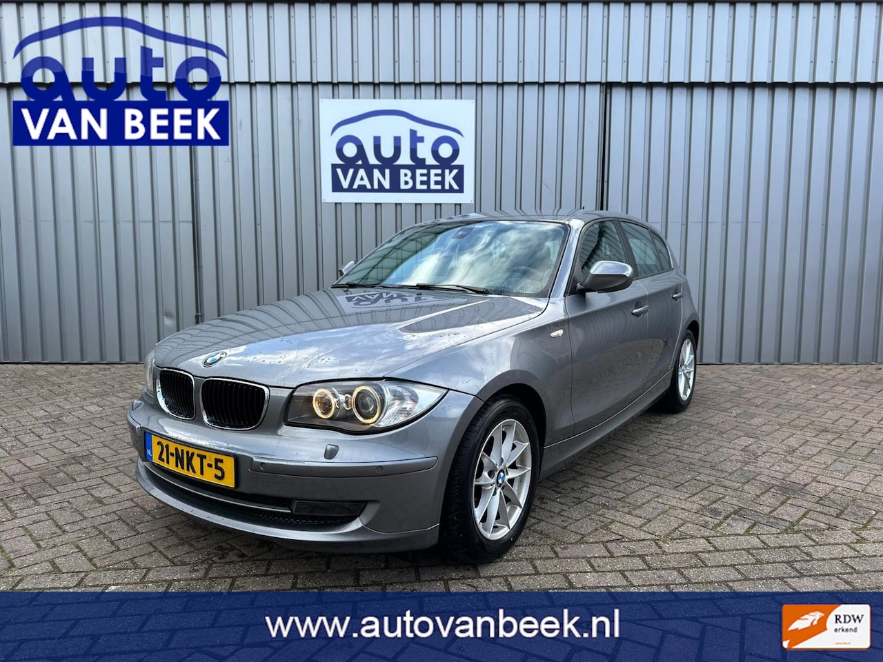 BMW 1-serie - 120i Business Line Edition | Airco | Navi | Automaat (export) - AutoWereld.nl