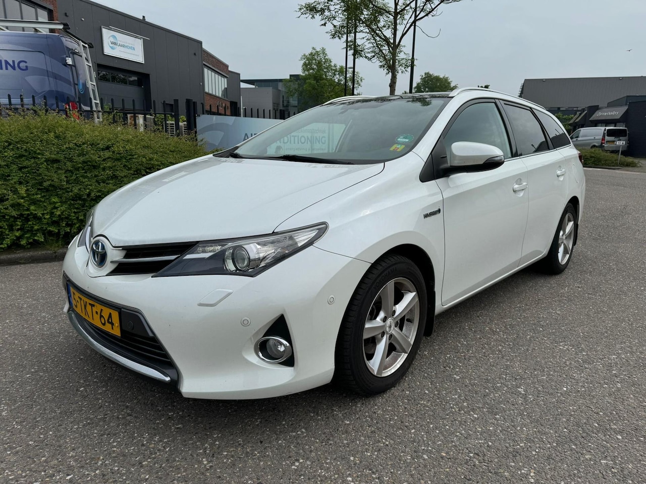 Toyota Auris Touring Sports - 1.8 Hybrid Lease+ Navi/Ecc/Pano - AutoWereld.nl