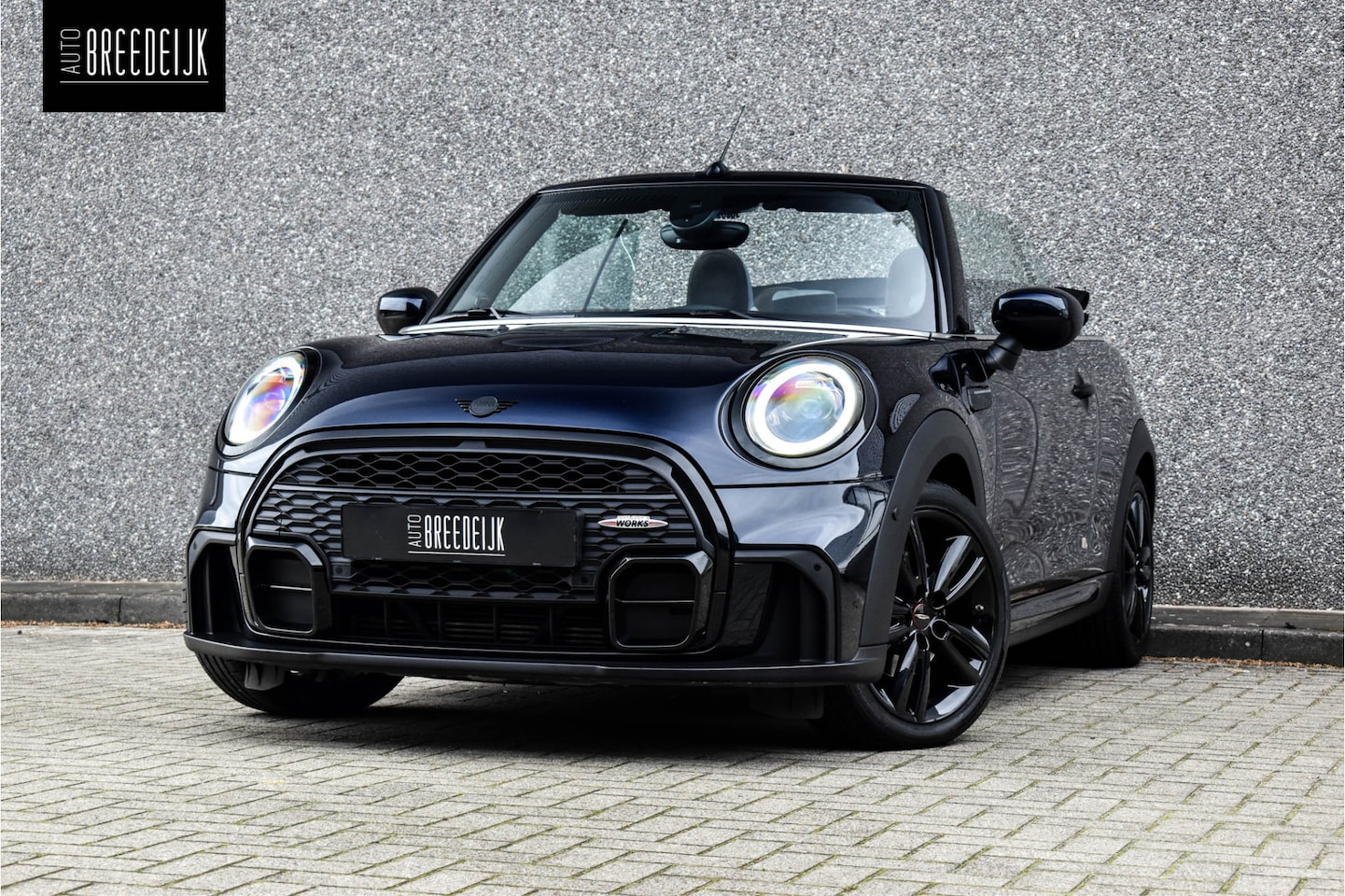 MINI Cabrio - 1.5 Cooper Aut. | JCW-Pakket | Navi | Head-Up | H&K | ACC | Camera | 17"LM | Enigmatic Bla - AutoWereld.nl