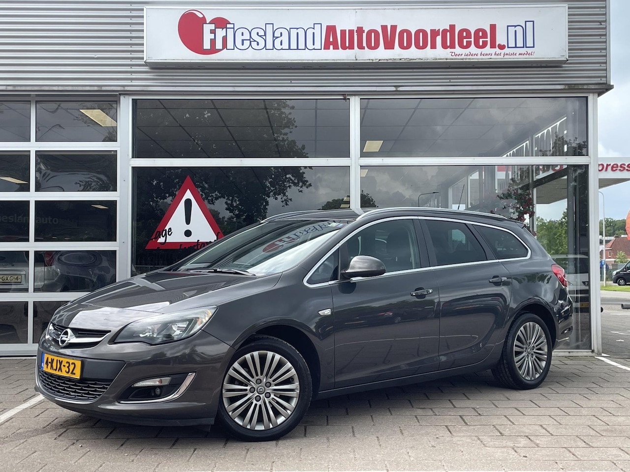 Opel Astra Sports Tourer - 1.4 Turbo Design Edition /Automaat/Clima/Cruise/Trekhaak/Dealer onderhouden/ - AutoWereld.nl