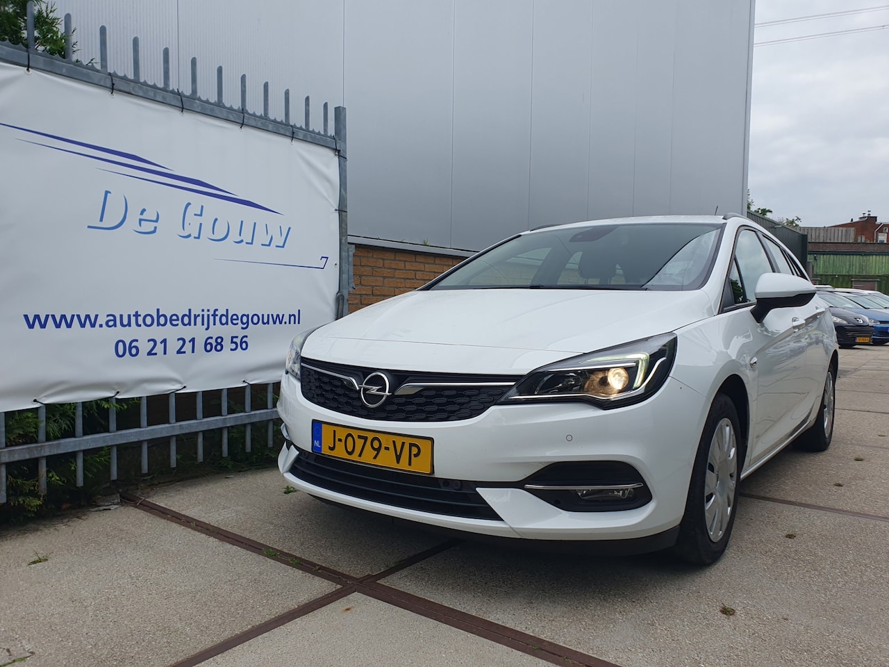 Opel Astra Sports Tourer - 1.2 Business Executive 1.2 Business Executive - AutoWereld.nl