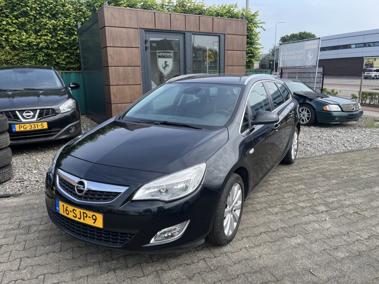 Opel Astra Sports Tourer - 1.4 Turbo Cosmo 1.4 Turbo Cosmo - AutoWereld.nl