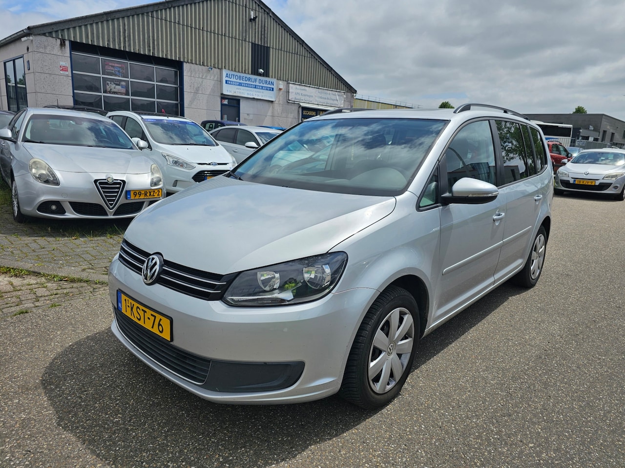 Volkswagen Touran - 1.2 TSI Comfortline BlueMotion 7p. NAV.+ Airco Bj:2013 NAP! - AutoWereld.nl