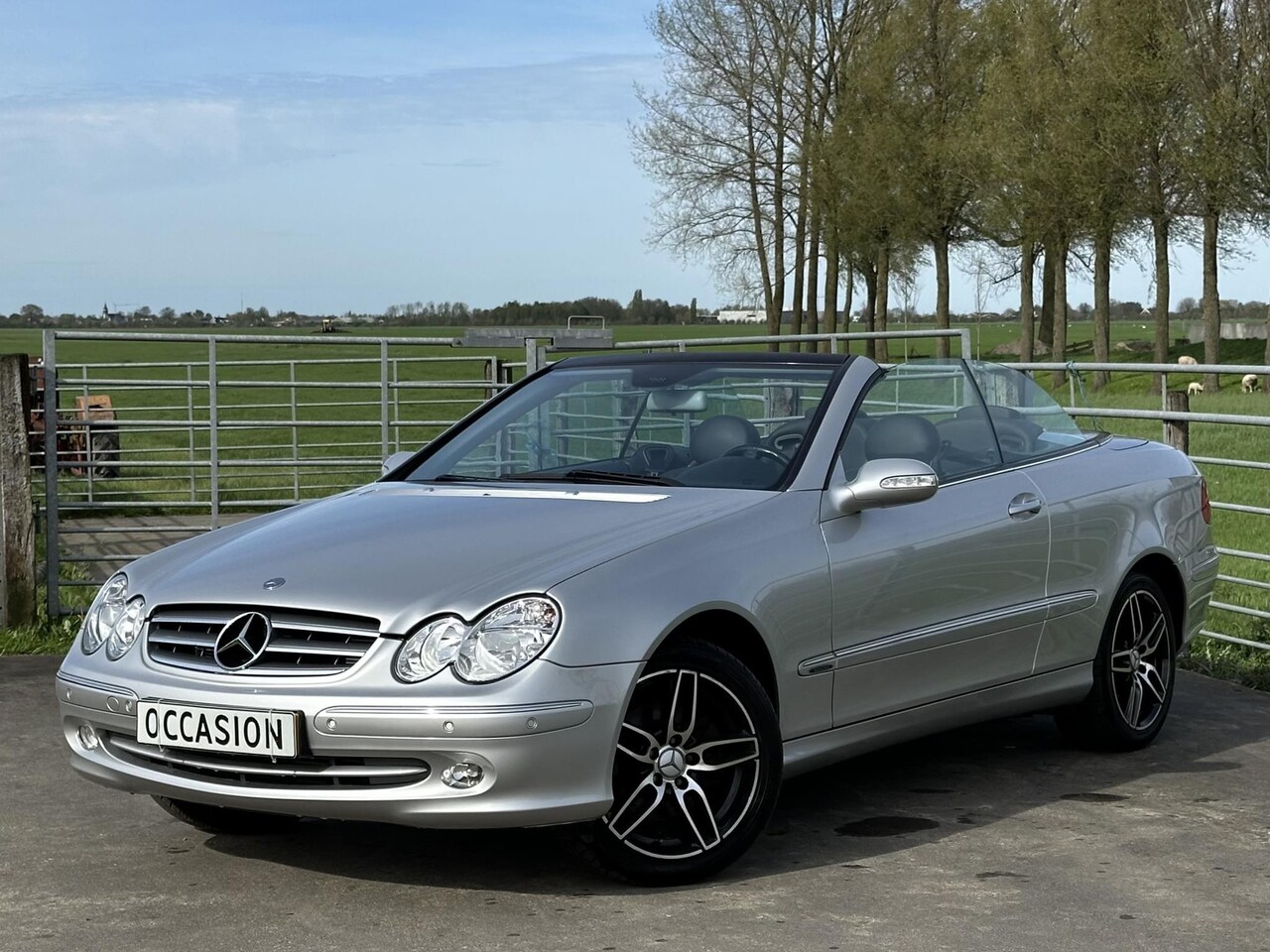 Mercedes-Benz CLK-klasse Cabrio - 200 K. Elegance CRUISE | LEER | AUTOMAAT | LAGE KM STAND | NAVIGATIE - AutoWereld.nl