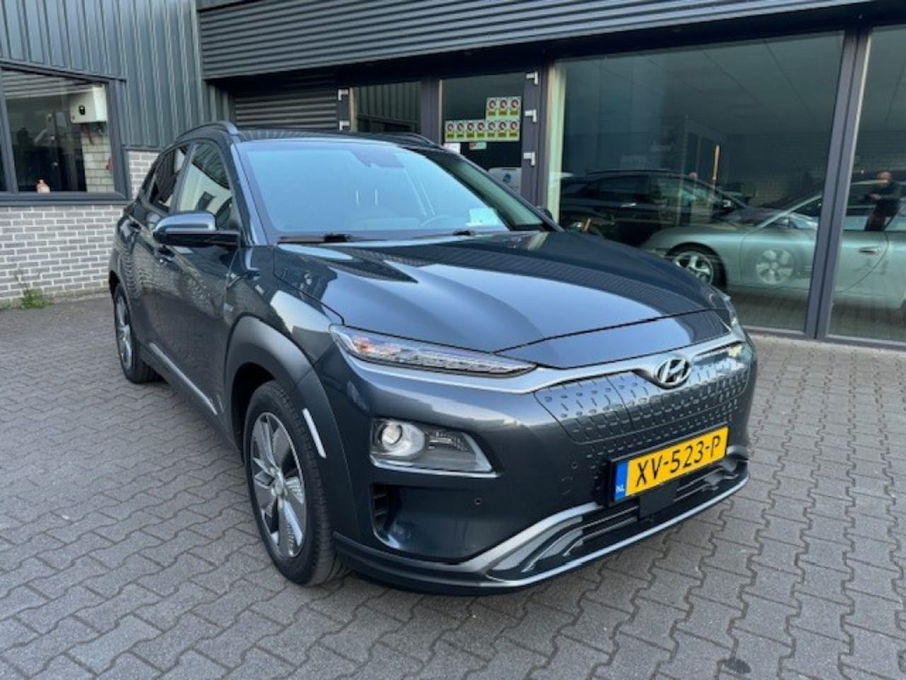 Hyundai Kona - 64 KWH LEER/NAV/XEN/CARPLAY - AutoWereld.nl