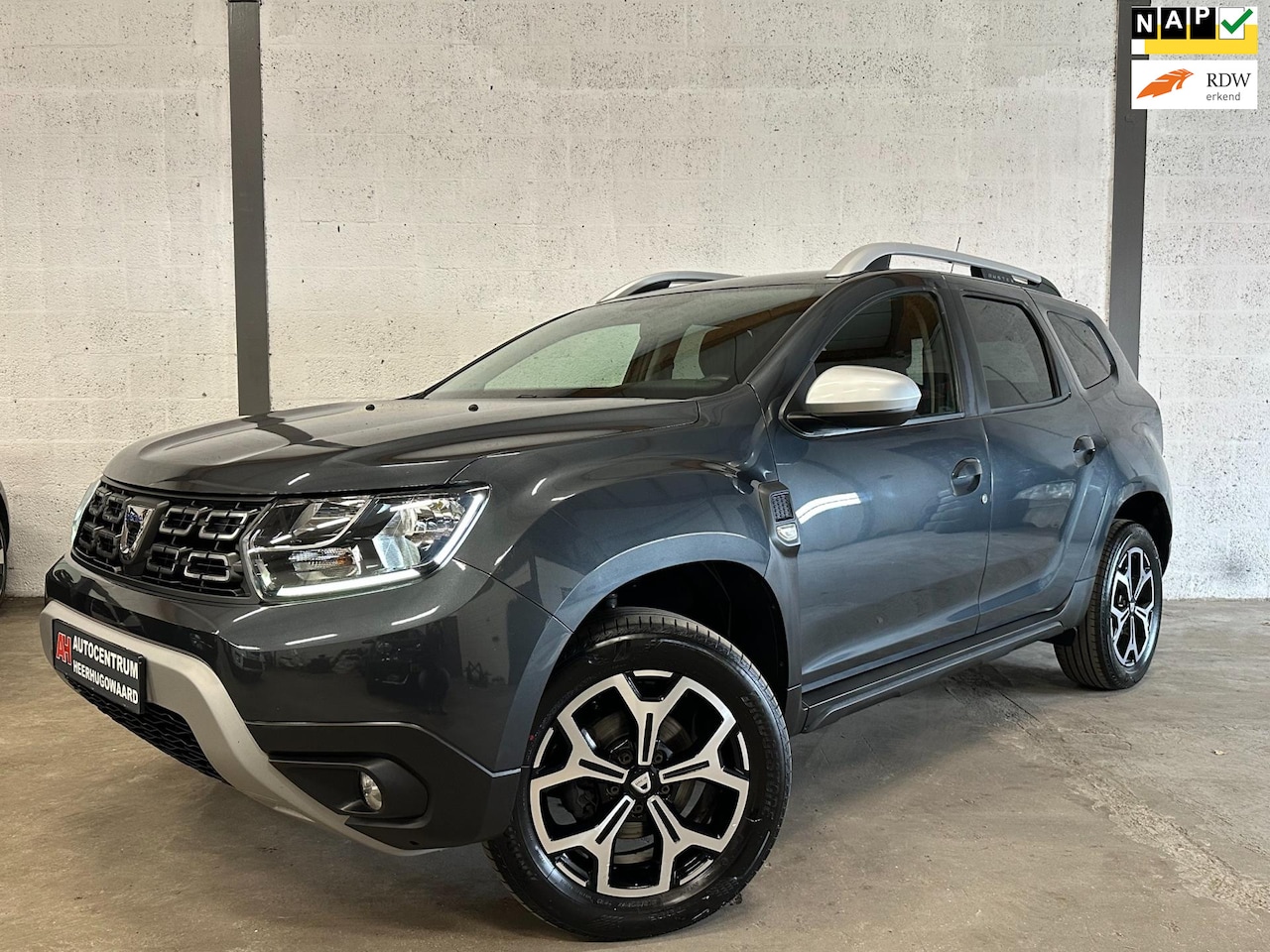 Dacia Duster - 1.3 TCe Prestige Navi|Cruise|Carplay|Trekhaak|Dealer Onderhouden !! - AutoWereld.nl