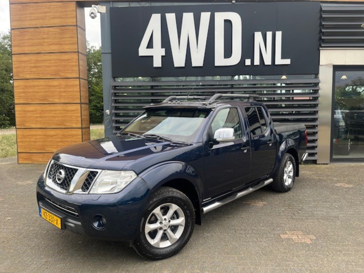 Nissan Navara - 2.5 dCi SE King Cab 4WD HOGE LAGE GEARING AICO CRUISE NAVI GAR € 12.900 EXCL Auto in goede - AutoWereld.nl