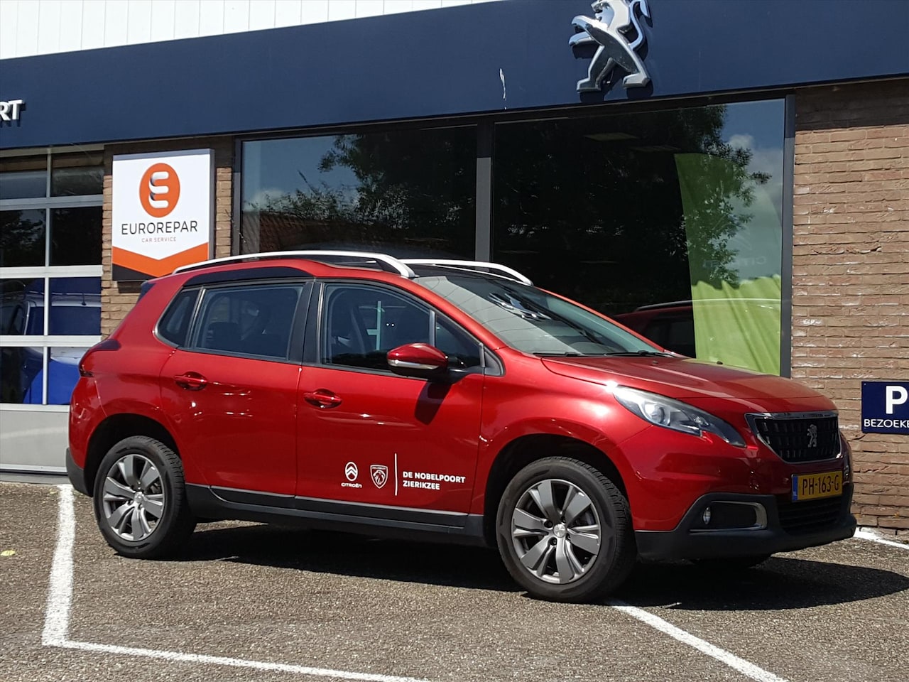 Peugeot 2008 - BLUE LION 1.2 PureTech-110pk Navigatie | Cruise control | AIRCO | Parkeersensoren | Panora - AutoWereld.nl