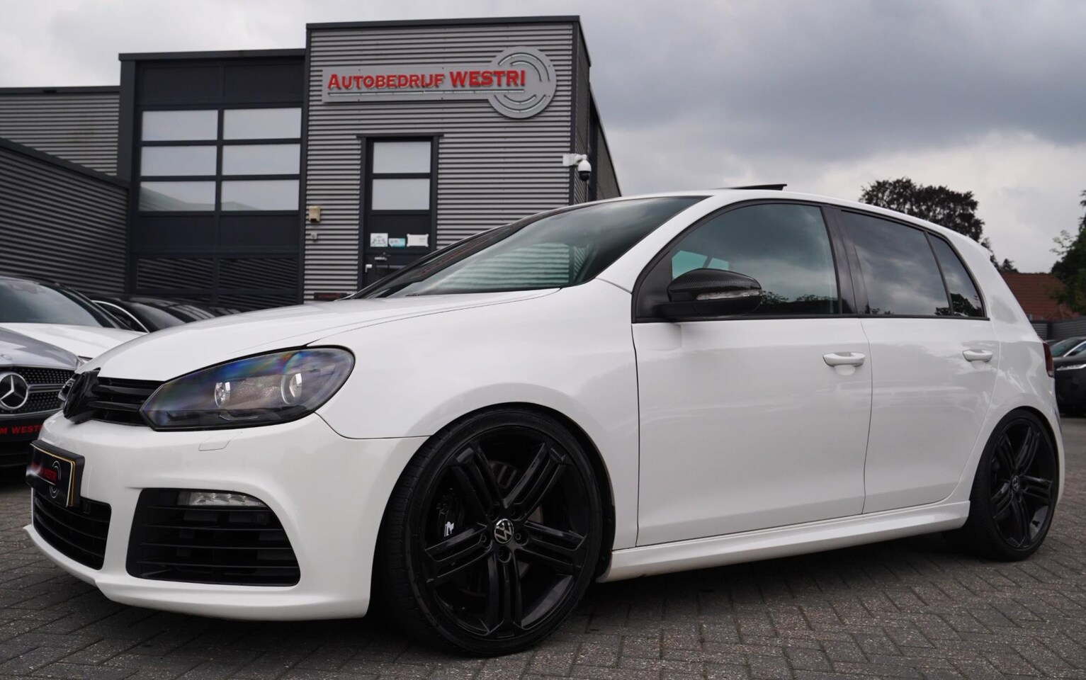 Volkswagen Golf - 2.0 R 4-Motion|Schuifdak|Verlaagd|Vol leer|Key less go - AutoWereld.nl