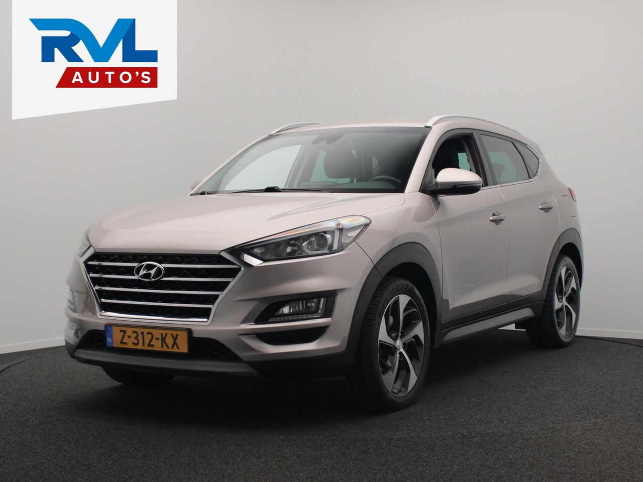 Hyundai Tucson - 1.6 T-GDI Premium 177PK Leder Navigatie Camera - AutoWereld.nl