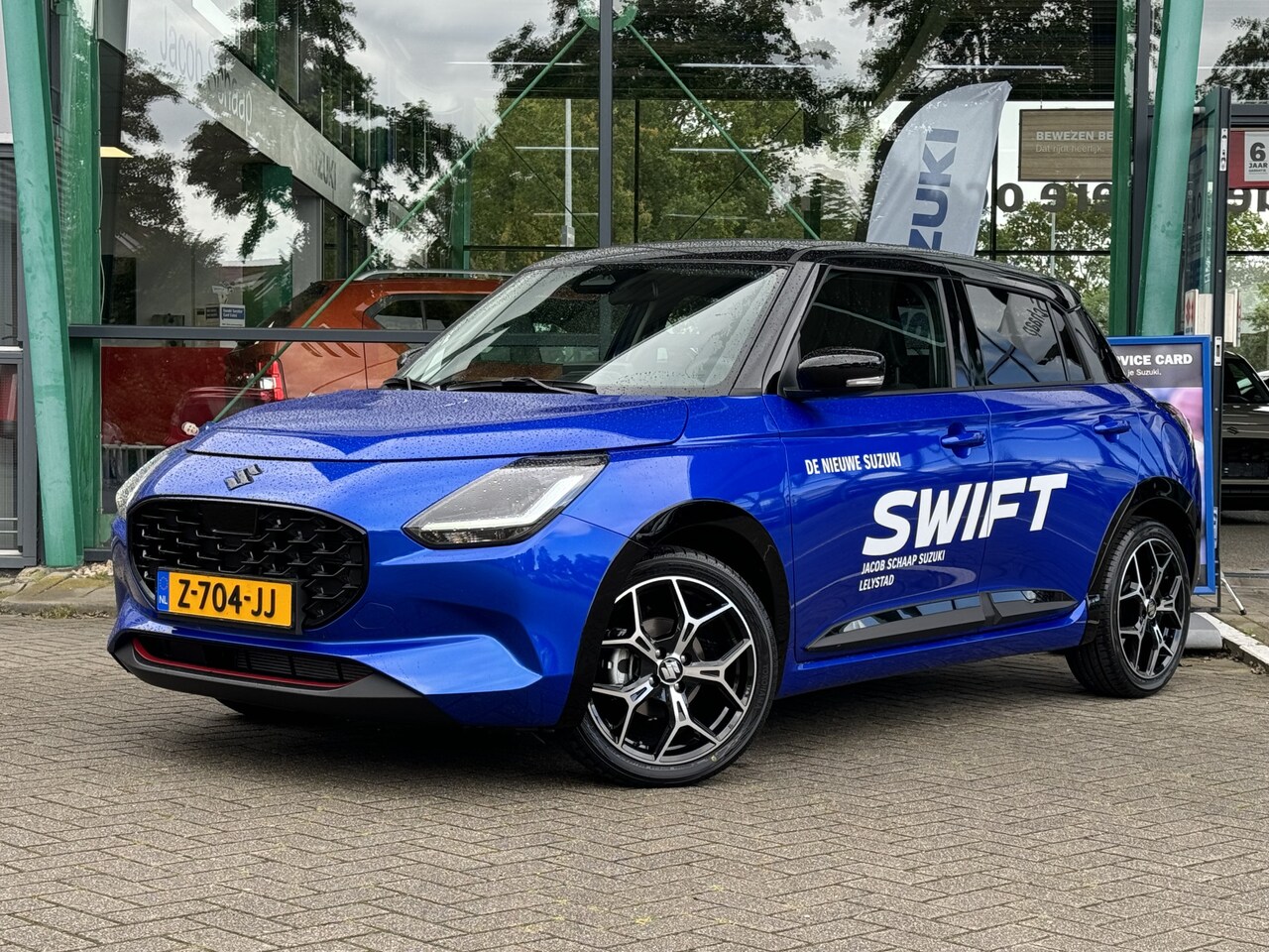 Suzuki Swift - 1.2 Style Smart Hybrid | Incl. stylingpakket t.w.v. 3700, - | Apple Carplay/Android Auto | - AutoWereld.nl