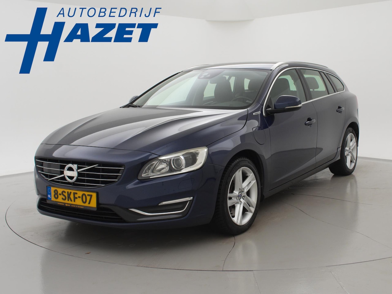 Volvo V60 - 2.4 D6 AWD PLUG-IN HYBRID SUMMUM 285 PK + LEDER / TREKHAAK / STOELVERW. / MEMORY / XENON / - AutoWereld.nl