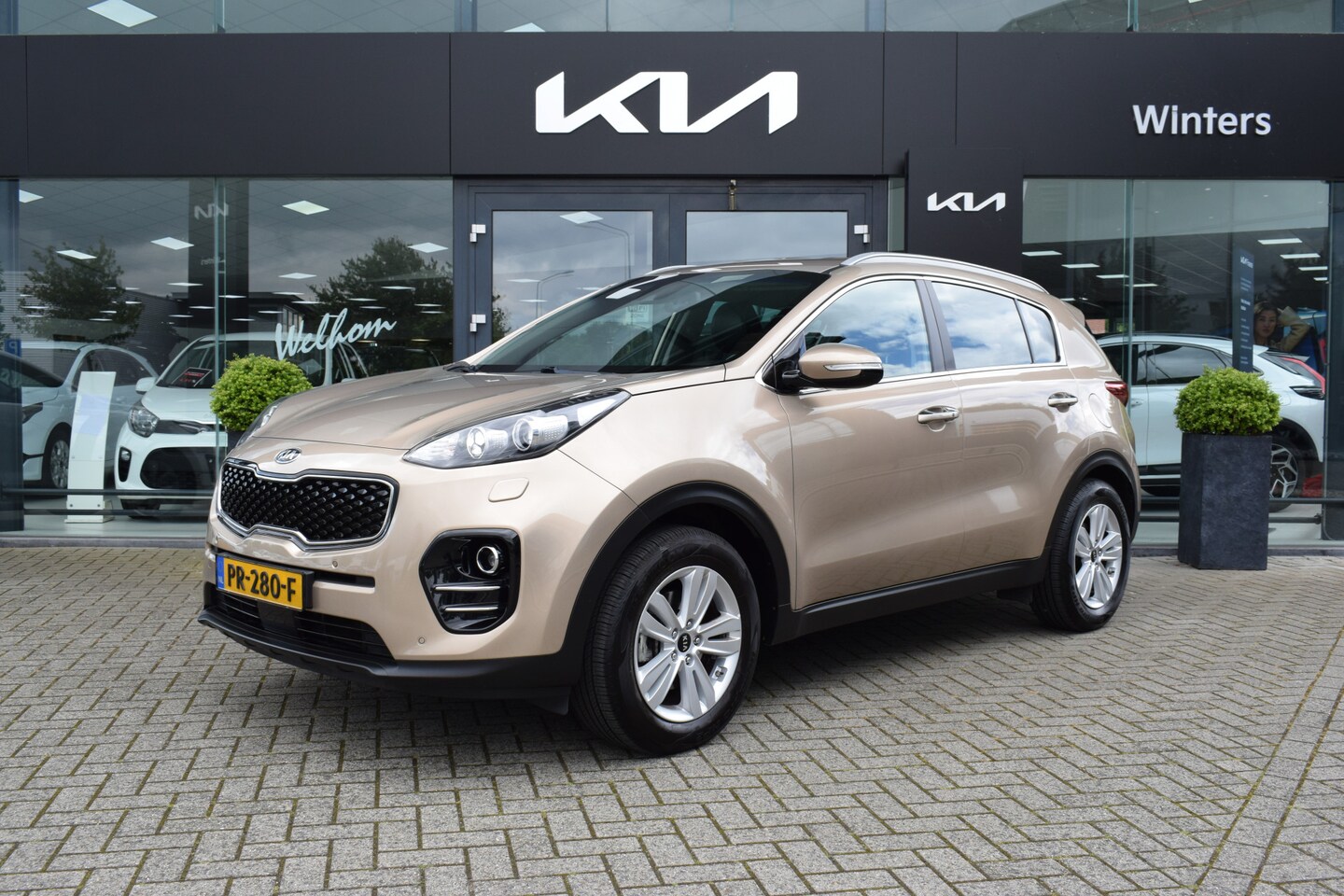 Kia Sportage - 1.6i-16V ISG ExecutiveLine ECC Cr.Control Navi+Camera+BT Leder+Verw. Trekhaak PDC Dealeron - AutoWereld.nl