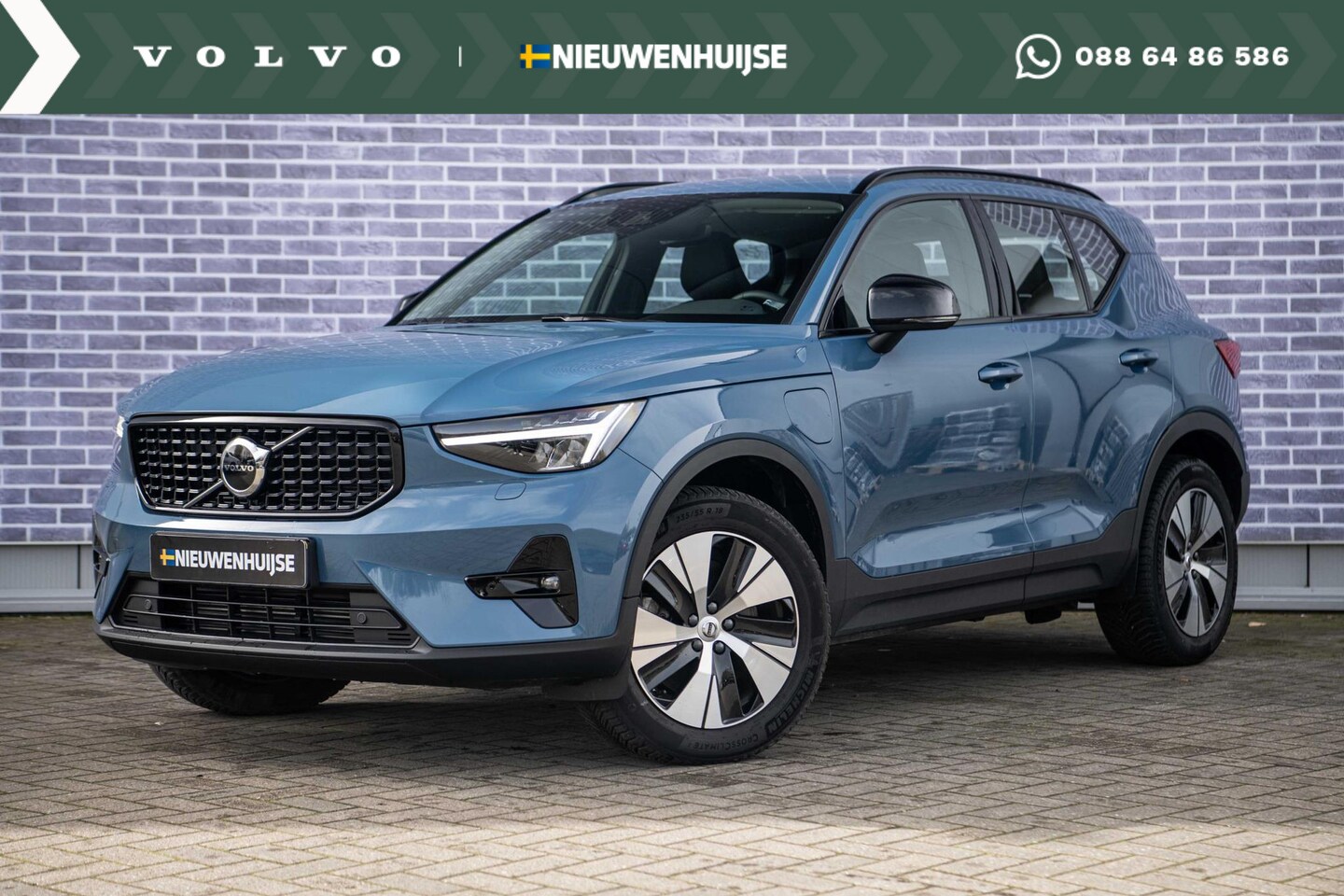 Volvo XC40 - 1.5 T5 Recharge Plus Dark Fin. € 796 p/m | Leder | Adaptieve Cruise Control | Power Seats - AutoWereld.nl