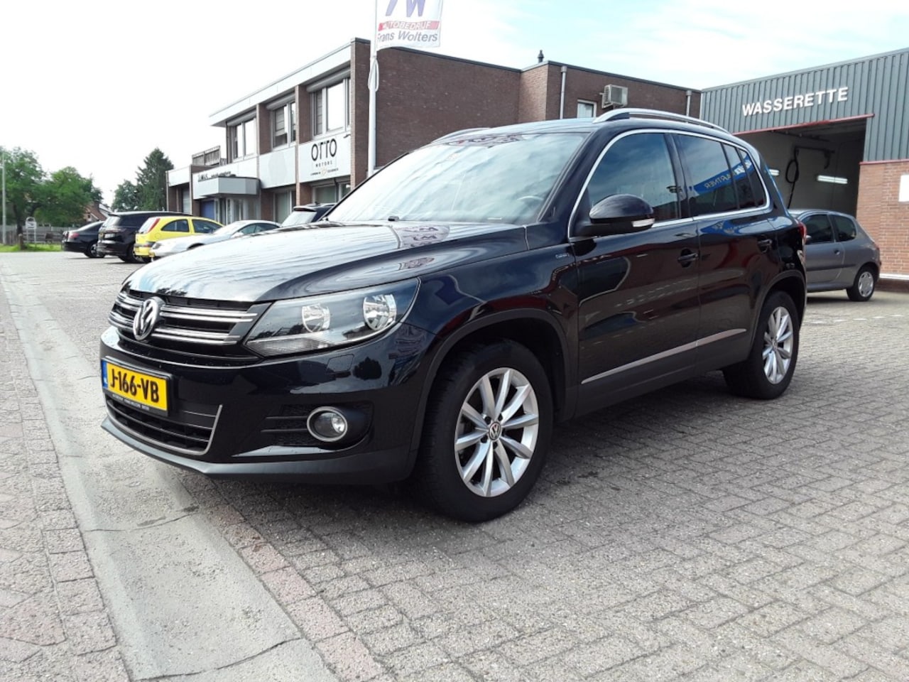 Volkswagen Tiguan - 1.4 TSI SPORTenSTYLE-LOUNGE / 150 PK / NAVI / TREKHAAK - AutoWereld.nl