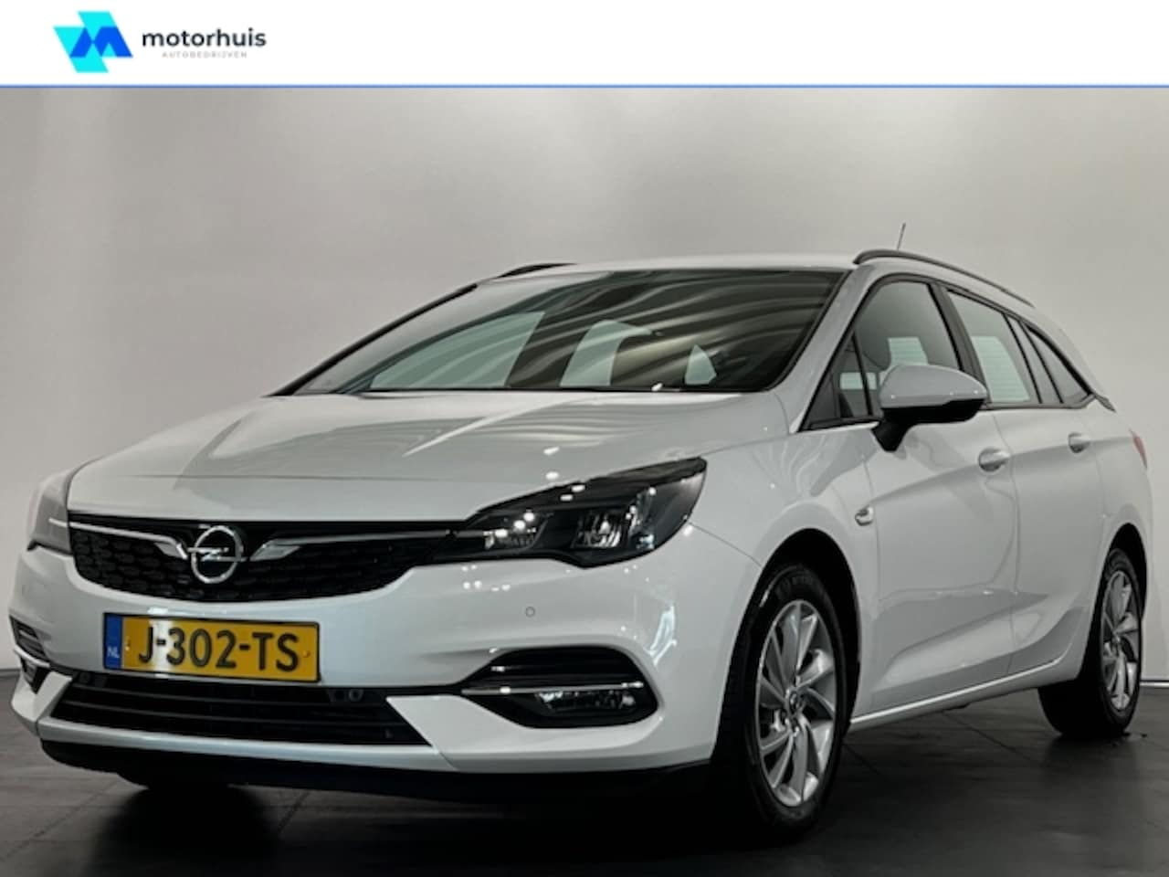 Opel Astra Sports Tourer - 1.4 Turbo 145pk Start/Stop Aut Edition/navigatie/camera - AutoWereld.nl