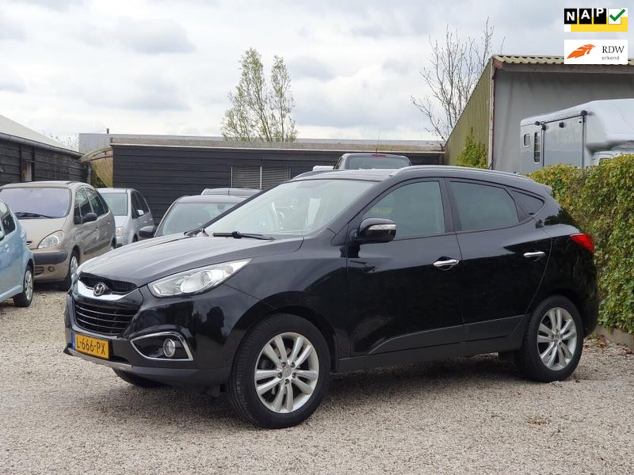 Hyundai ix35 - 2.0i 4WD i-Catcher Leer/Navigatie/Panodak - AutoWereld.nl