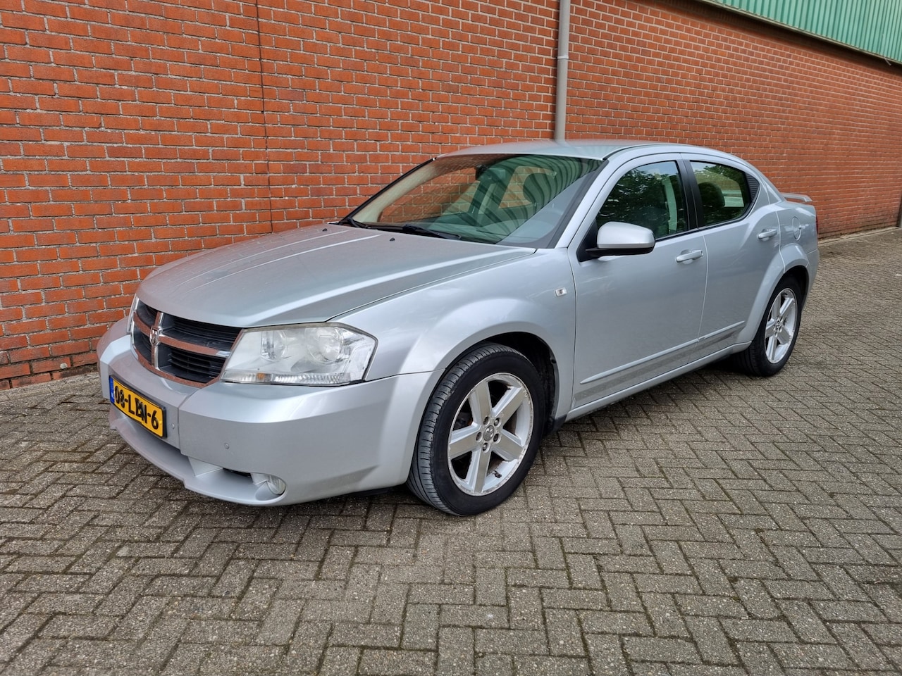 Dodge Avenger - 2.0 SE NAV.+ Airco Bj:2010 NAP! - AutoWereld.nl